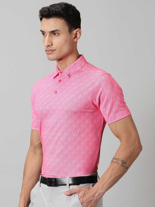 Image of Inspired by the summers and winters of the OOTY GYMKHANA , THE UPHILL GOLF POLO in pink features special 4 X way stretch fabric. The self made collar and placket with contrasting print adds to the style quotient. The silicon detailing are placed on the front and back.  From Firstcut.co