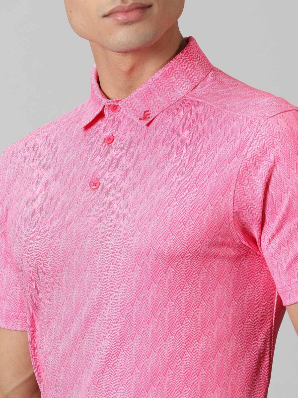 Image of Inspired by the summers and winters of the OOTY GYMKHANA , THE UPHILL GOLF POLO in pink features special 4 X way stretch fabric. The self made collar and placket with contrasting print adds to the style quotient. The silicon detailing are placed on the front and back. From Firstcut.co