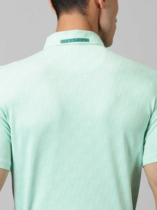 Image of Inspired by the summers and winters of the OOTY GYMKHANA , THE UPHILL GOLF POLO in summer green and steel grey features special 4 X way stretch fabric. The self made collar and placket with contrasting print adds to the style quotient. The silicon detailing are placed on the front and back. From Firstcut.co